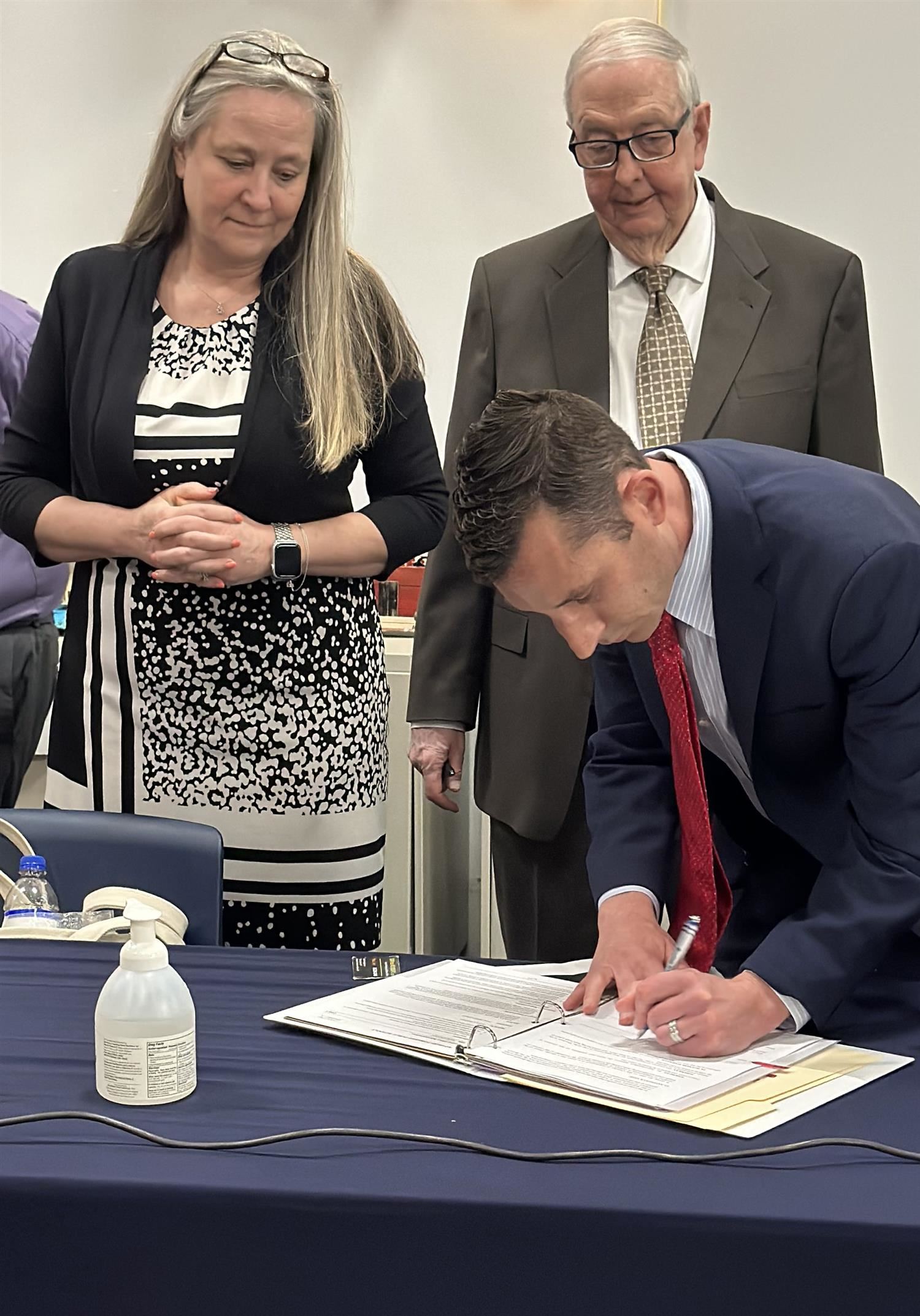 Dr. Frank Santora signing contract